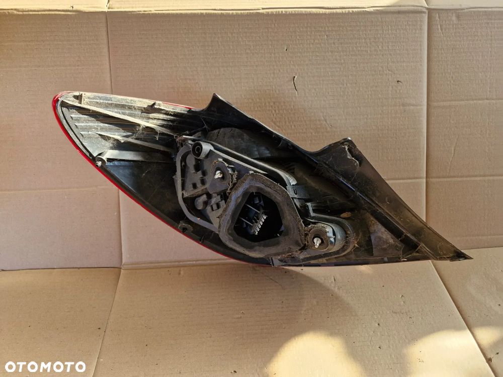 Lampa prawa lewa tylna tył Opel Corsa D EUROPA 5 drzwi jasna - 7