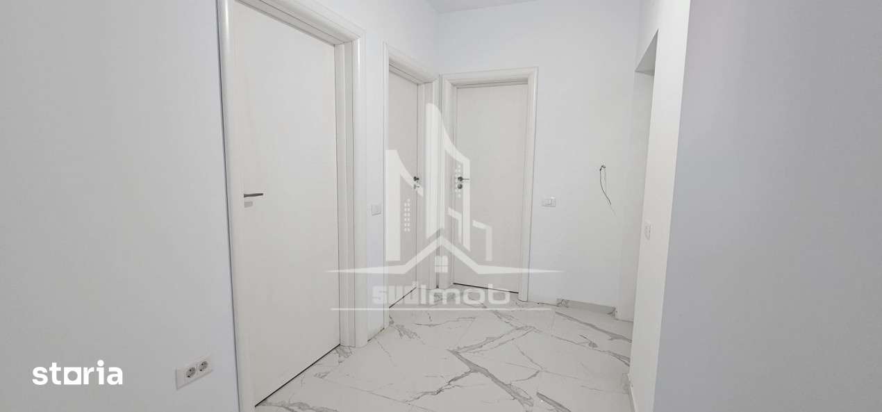 Apartament 2 camere decomandat cu bucatarie inchisa — fotografia 3