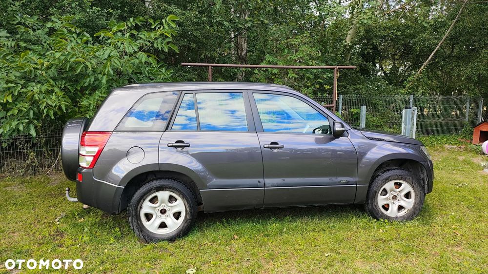 Suzuki Grand Vitara 2.0 - 7