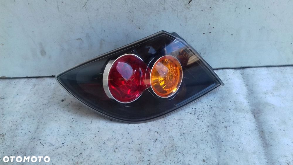 LAMPA LEWY TYŁ TYLNA MAZDA 3 BK HB 03-