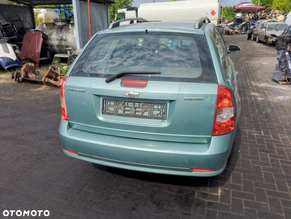Chevrolet Lacetti I (03-09r.) 1.6 B 108KM. Silnik F16D3 Skrzynia EMG.Cały na części.GWARANCJA !!! Przód Tył Zestaw Komplet Drzwi Klapa Zderzak Błotnik Maska Grill Atrapa Szyba Pas Lampa Lusterko Boczki Fotel Kanapa Kokpit Deska Rozdzielcza Przełącznik Włącznik Sterownik Przewody Wiązka Instalacja Moduł Komputer Czujnik Listwa Pompa Alternator Wtryski Głowica Rozrusznik Kompresor Sprzęgło Dwumas Silnik Skrzynia ABS Klimatyzacji Paliwa Wspomagania Kolektor Turbina Przepustnica Zawór Chłodnica Koło Hak Belka Sanki Zawieszenie Mcpherson Półoś Amortyzator Wydech Tłumik Zacisk Most - 3