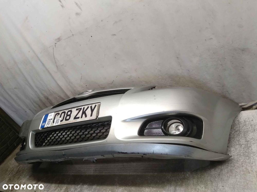 ^ ZDERZAK PRZÓD PRZEDNI DO TOYOTA COROLLA VERSO LIFT FL 1C0 SREBRNY HALOGENY - 4