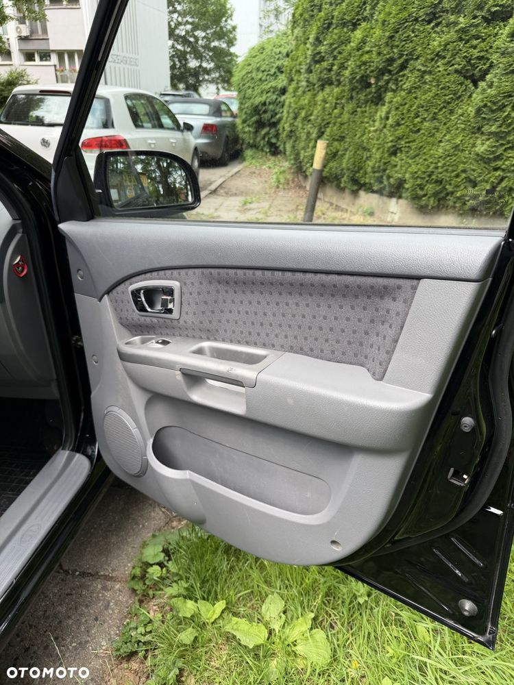 Kia Carens 2.0 EX - 18