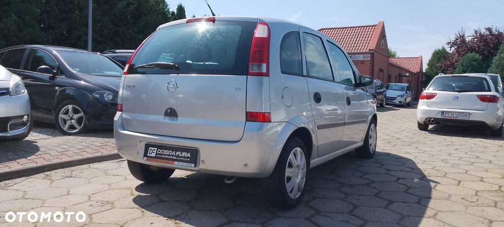 Opel Meriva ver-1-6-16v-cosmo-easytronic - 26