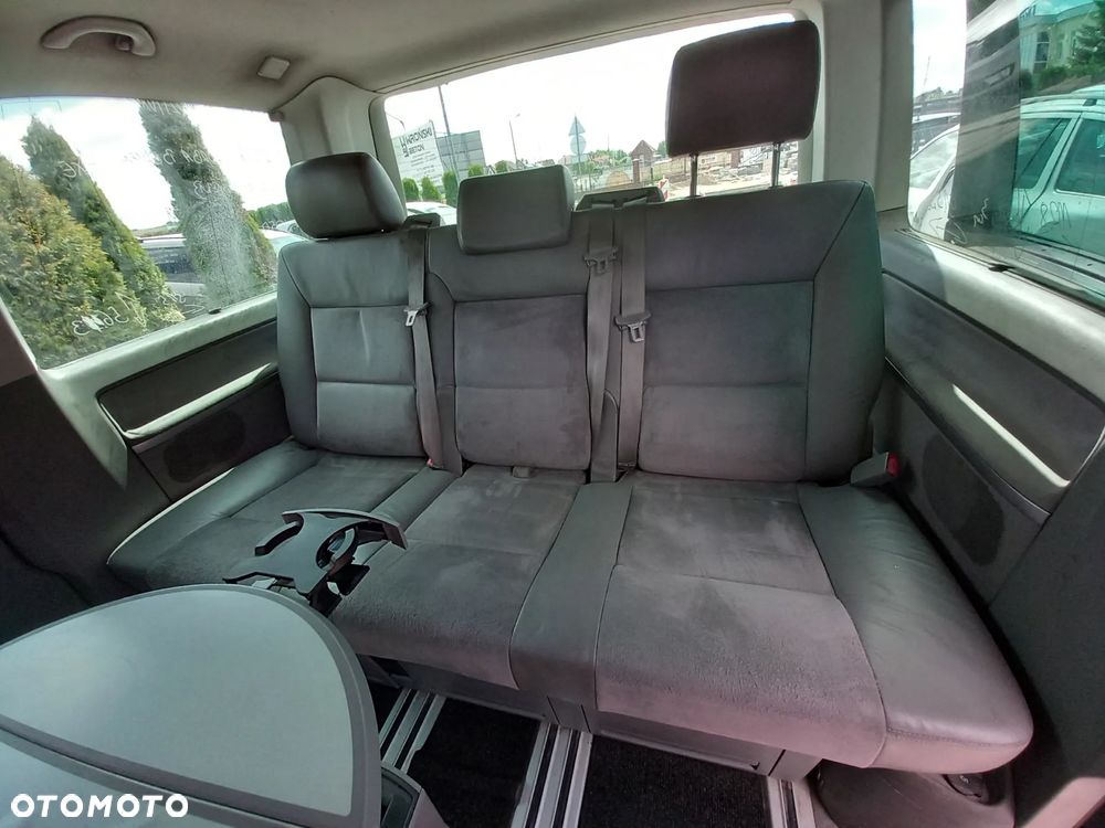VW TRANSPORTER T5 MULTIVAN KOMPLETNA PRZEKŁADKA FOTELI DYWANÓW PODSUFITKI BOCZKI SŁUPKI NA MULTIVAN KOMPLET Z STOLIKIEM I ROLETĄ SKÓRA ALCANTARA - 9