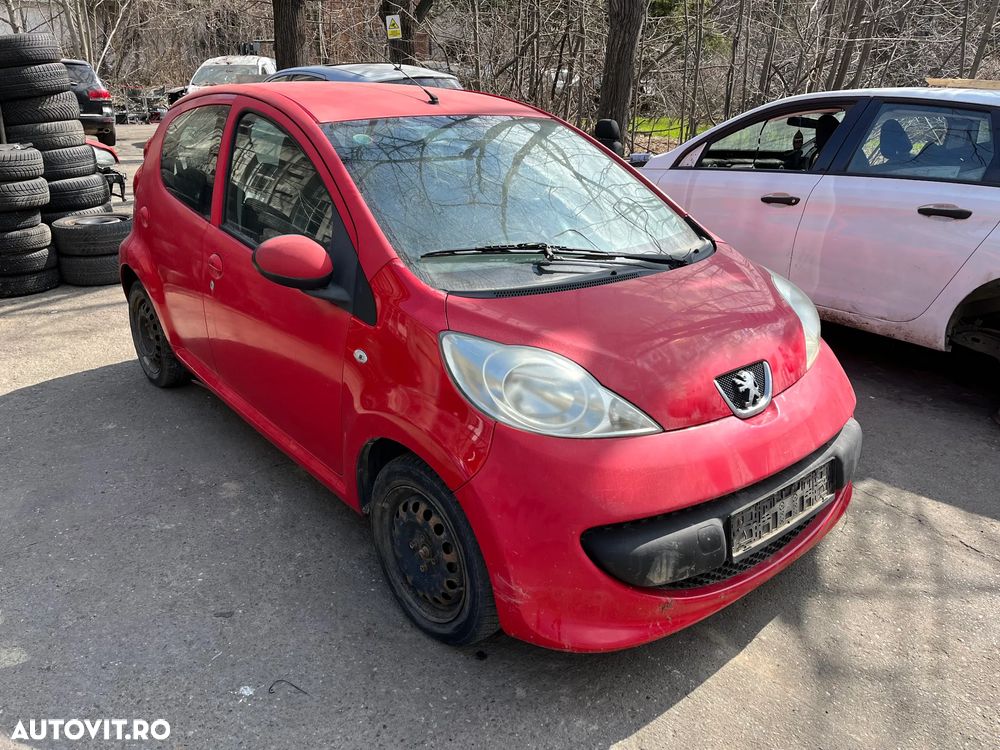 Dezmembrez Peugeot 107 rosu 2007 1.0 benzina 4usi - 16