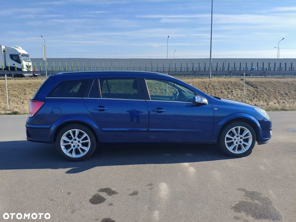 Opel Astra 1.8 Sport - 8