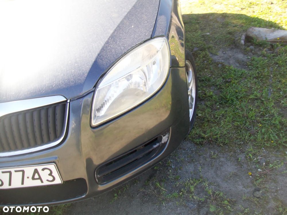LAMPA LEWY PRZÓD SKODA FABIA 2 - 1