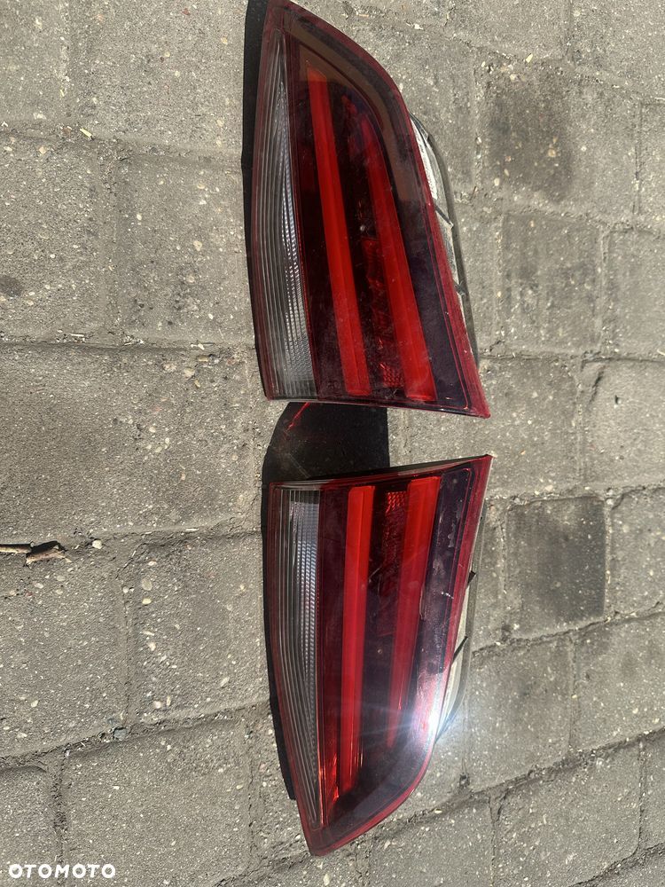 Opel astra k kombi led lampy w klape 39032040 39032041