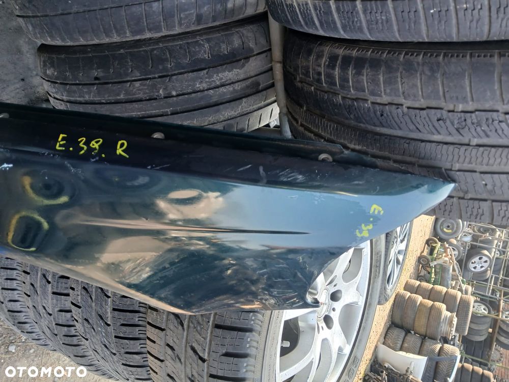 BŁOTNIK BMW E39 prawy  OE - 6