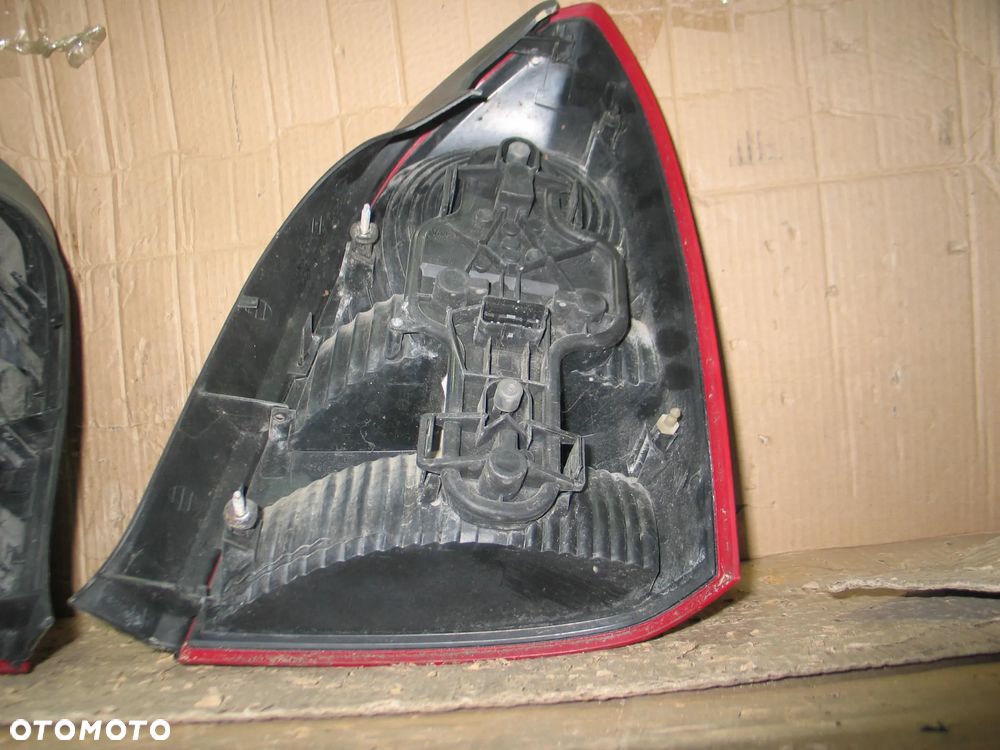 lampa tyl prawa lewa nissan primera P12 sedan oryginal - 13
