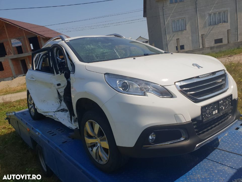 dezmembrez Peugeot 2008 VOLAN STANGA an 2014 motor 1.6hdi 68kw 92cp 9HP cutie de viteze automata usa portiera stanga fata spate navigatie cu touchscreen dezmembrari 207, 208 2008 508 5008 3008 - 5