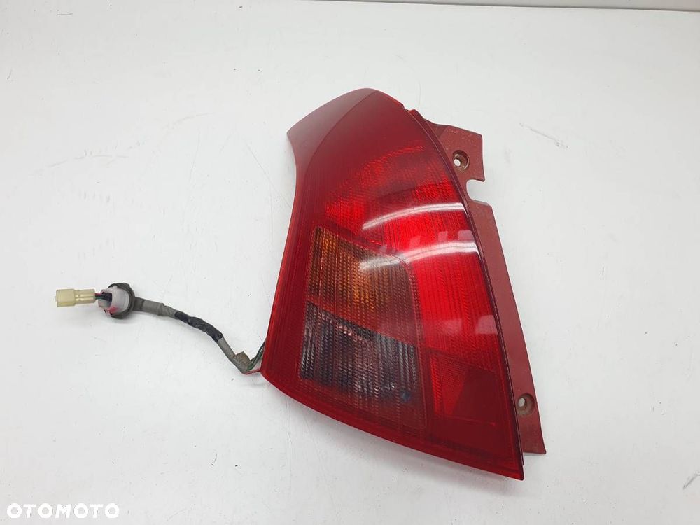 LAMPA TYŁ LEWA SUZUKI SWIFT III P4476L EUROPA 2005 - 1