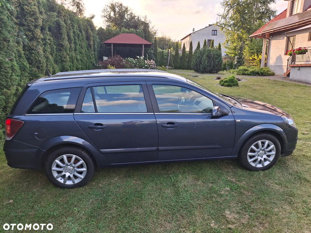 Opel Astra 1.8 Caravan Cosmo - 11