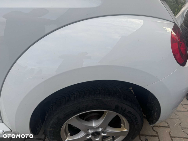 Błotnik Volkswagen Beetle kolor LC9A lewy tył