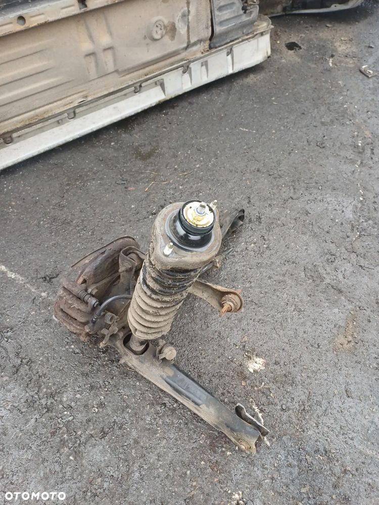 Wahacz tylny lewy prawy 1.8 gdi Mitsubishi Carisma 2003r lift 4G93 - 3