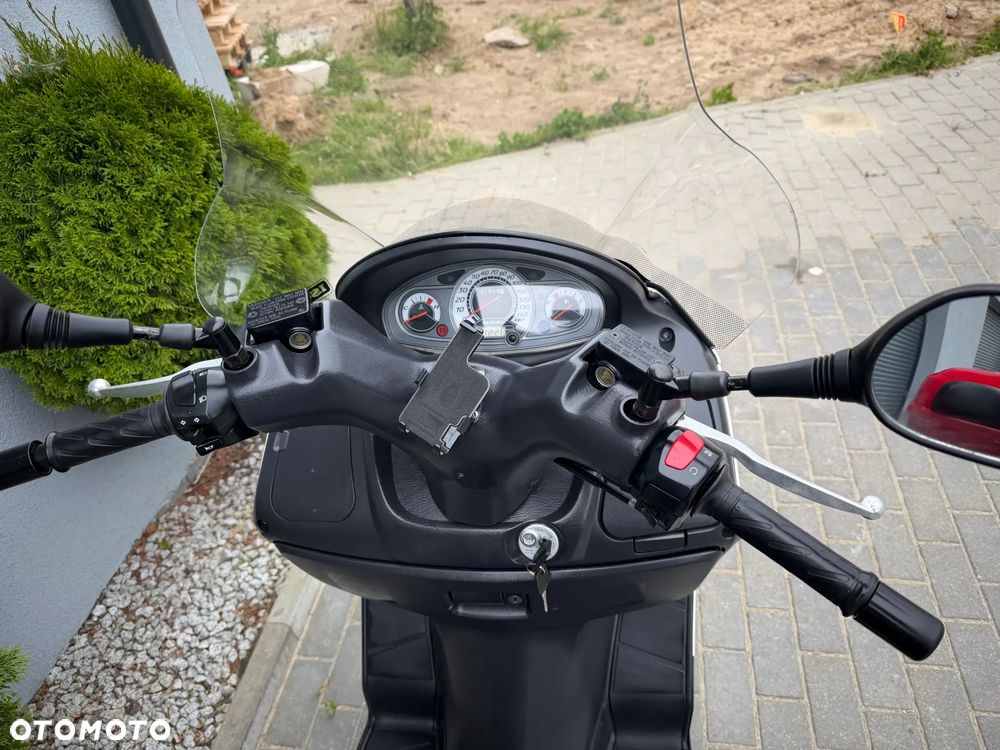 Suzuki Burgman - 24