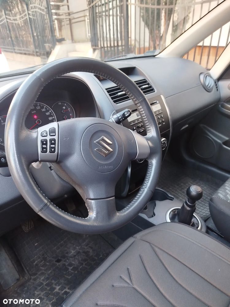 Suzuki SX4 1.6 GLX / Comfort - 11