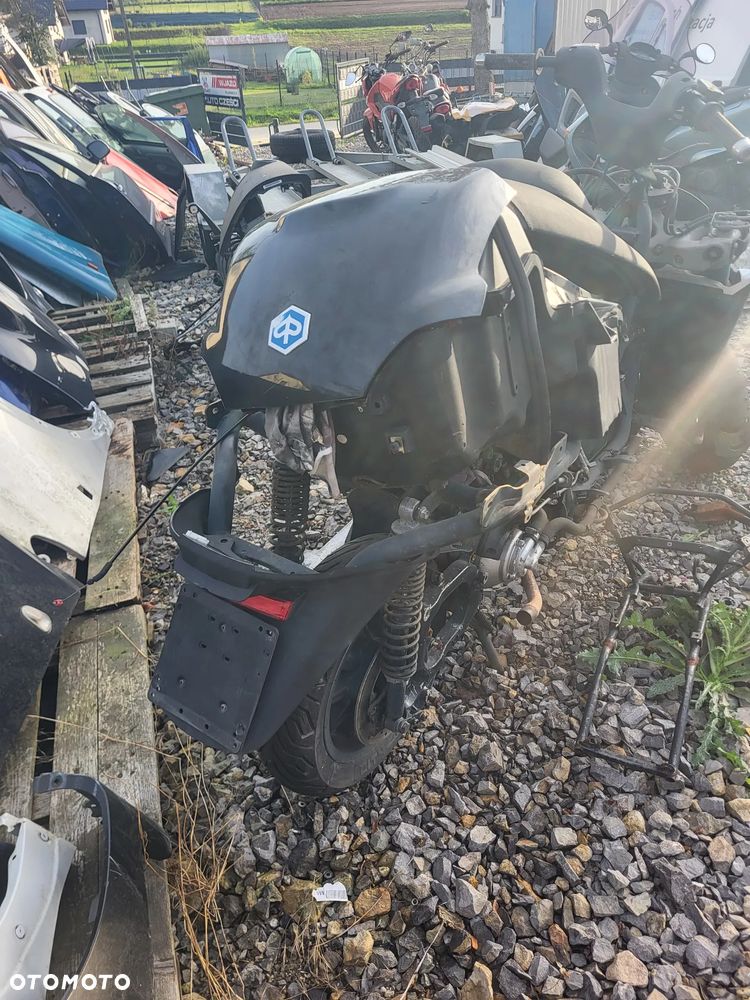 EU Piaggio MP3 125 250 500 06- Owiewka Szyba Koło Osłona Lagi Tłumik Kanapa Części - 9