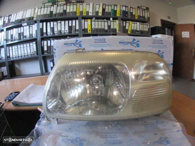 Farol Far1597 SUZUKI GRAND VITARA 1 BREAK 1999 2.0TDI 90CV 5P PRETO ESQ H4 KOITO - 1