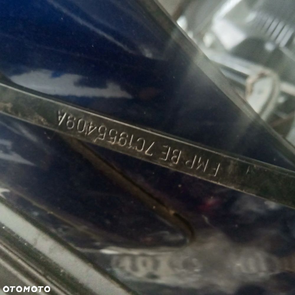 Ramię wycieraczki lewe Crafter Man 7C1955409A - 2