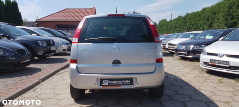 Opel Meriva ver-1-6-16v-cosmo-easytronic - 25