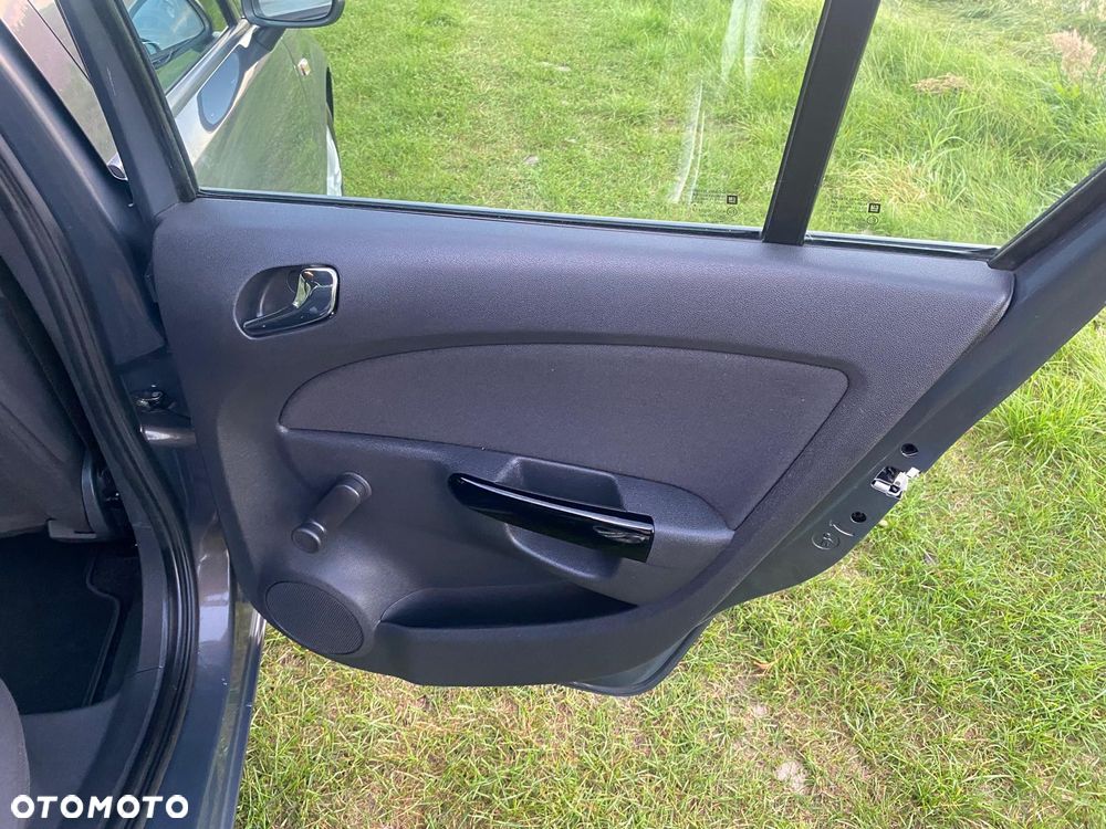 Opel Corsa 1.2 16V Enjoy - 11