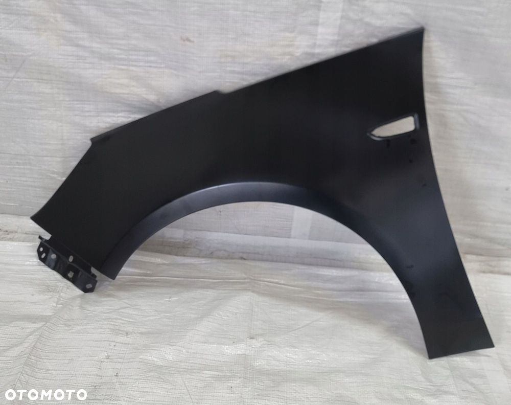 BŁOTNIK PRZEDNI LEWY OPEL ZAFIRA C 13355187 NOWY ORYGINAŁ
