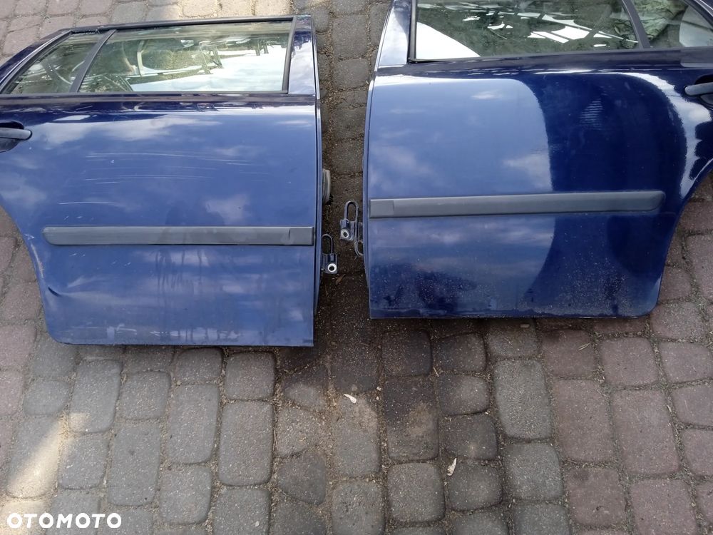 PODNOŚNIK ELEKTRYCZNY SZYB TYLNYCH LEWYCH LUB PRAWYCH SKODA OCTAVIA I KOMBI - 1