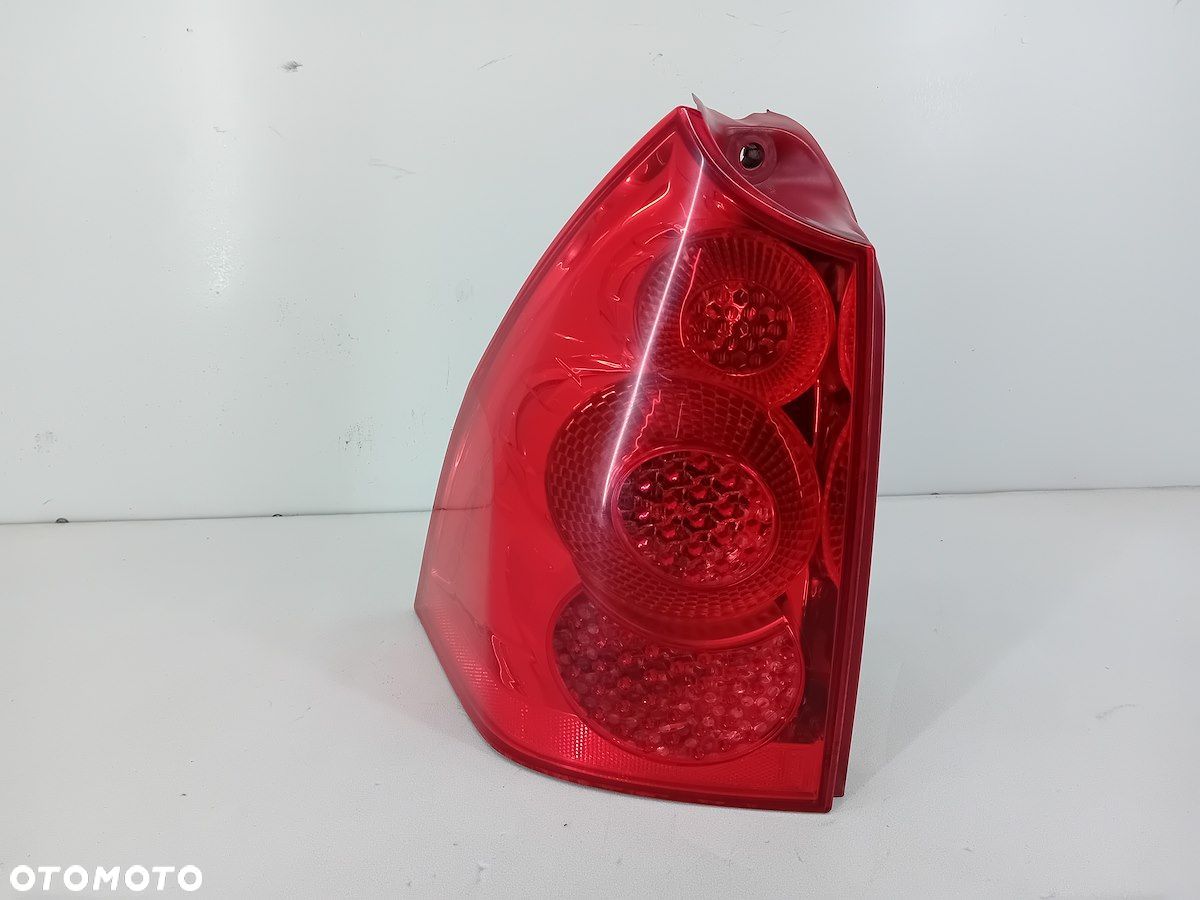 LAMPA TYLNA LEWA PEUGEOT 307 SW 2.0 16V BENZYNA KOMBI 557686 - 1
