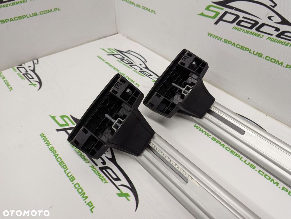 Bagażnik dachowy Thule: belki 860 + Stopy 7106 + kit - 5