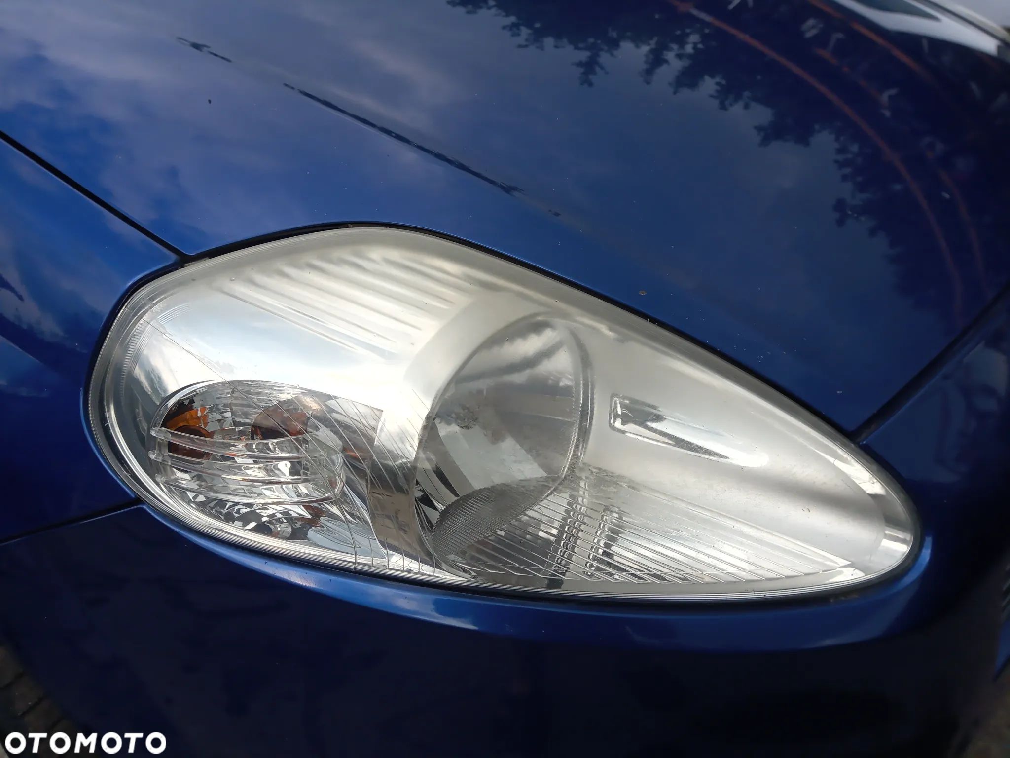Fiat Grande Punto  lampa przód przednia prawa lewa - 1