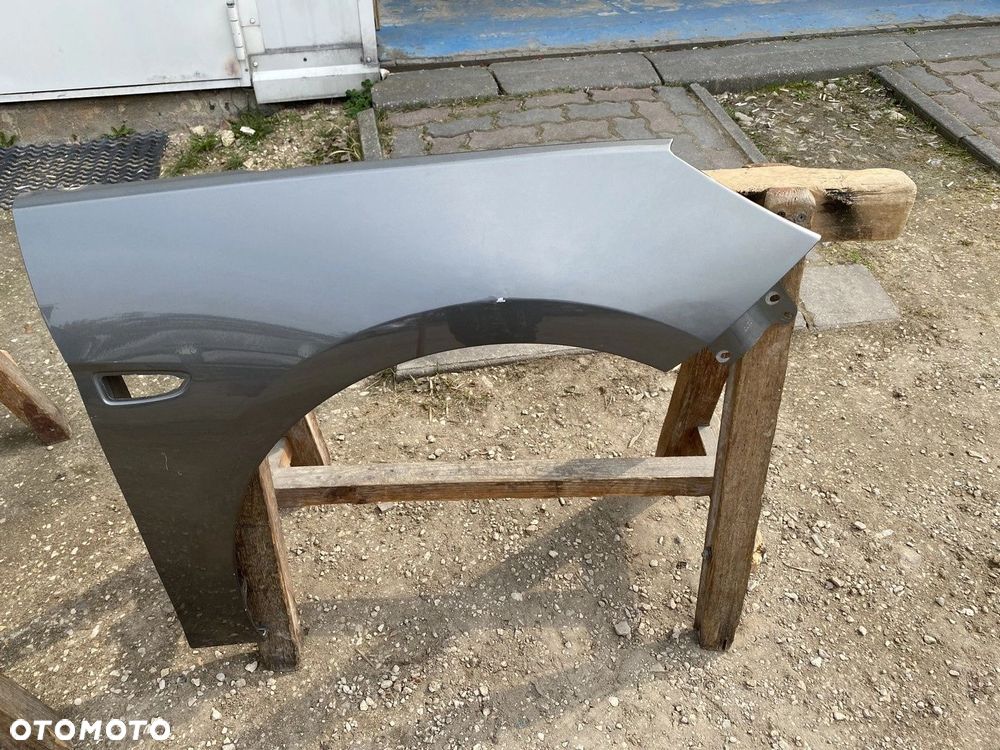 BŁOTNIK PRZEDNI PRAWY OPEL ASTRA V 39011391 - 2