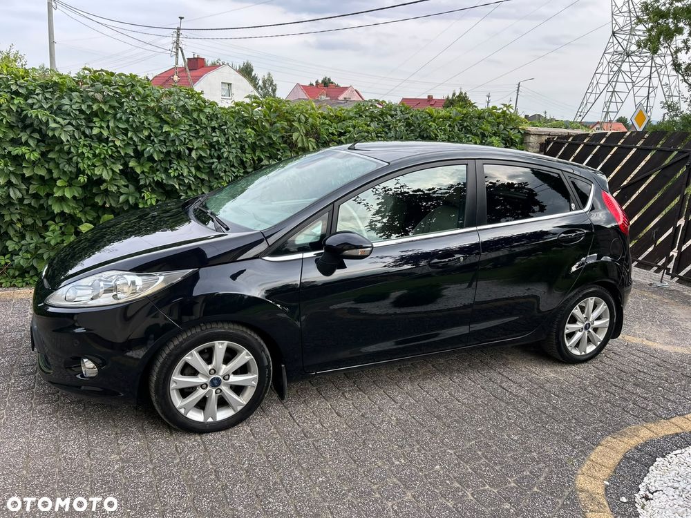 Ford Fiesta 1.4 Ghia - 4