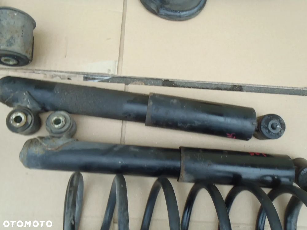 sprężyna sprężyny amortyzator tył tylne fiat panda II seicento cinquecento punto I II lift orginał - 7