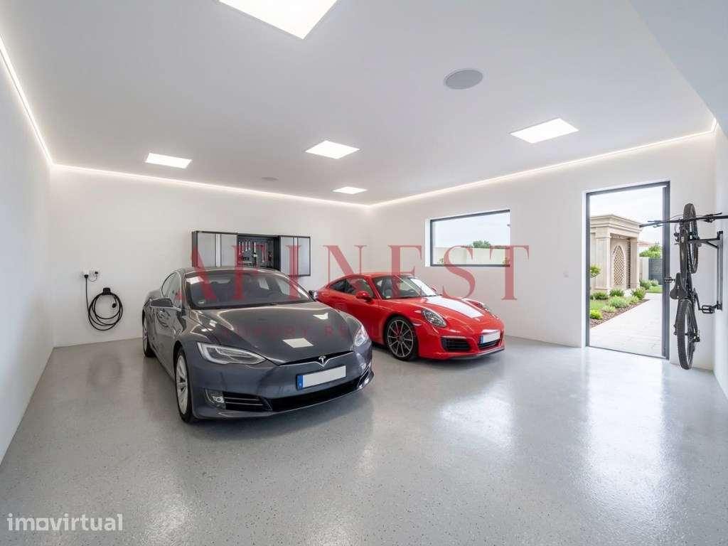 MORADIA T5 COM 5 SUITES COM PISCINA AQUECIDA, PISO RADIANTE E ACABA... - Grande imagem: 3/32
