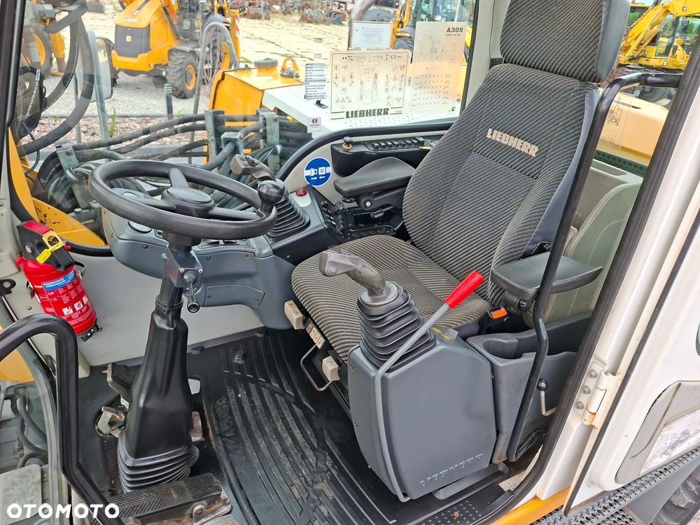 Liebherr A309 ROTOTILT - 2