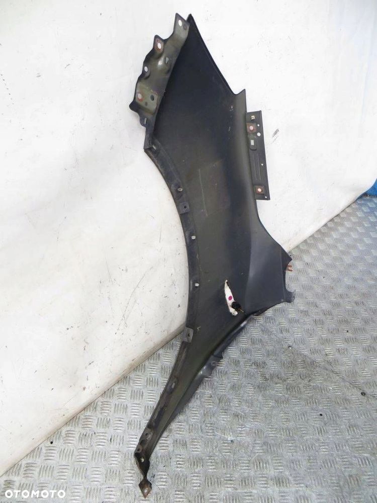 SSANGYONG TIVOLI BŁOTNIK PRAWY PRZÓD ACT 14- - 5