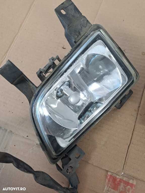 Proiector stanga dreapta Mazda 323 - 2