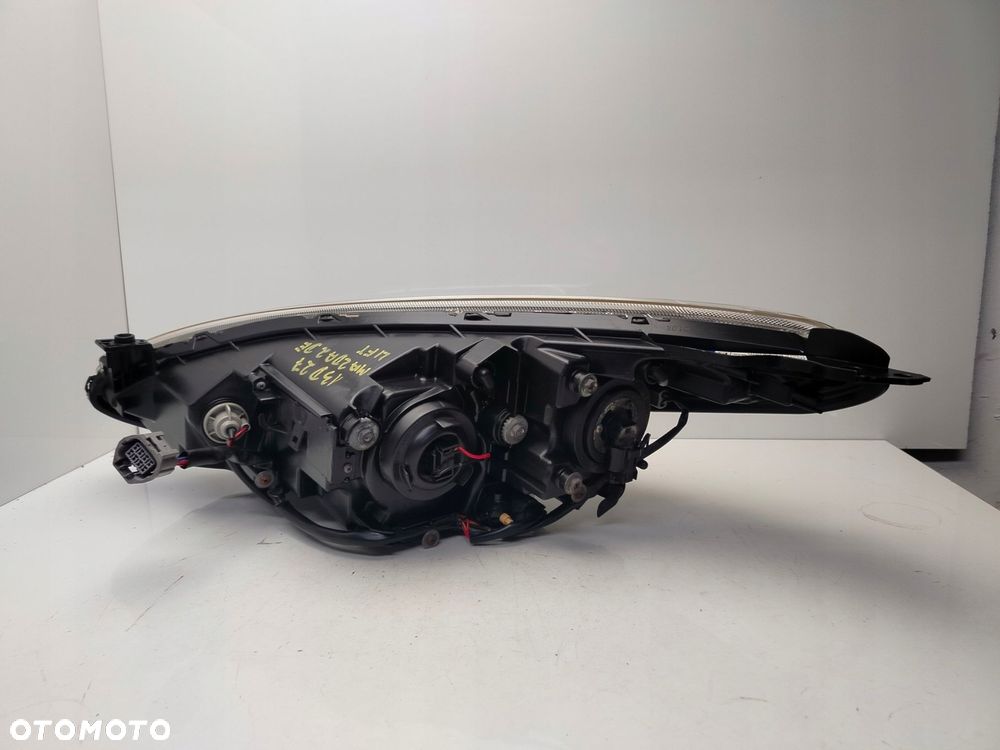 mazda 2 de 2011r reflektor lampa prawy przód prawa przednia soczewka - 6