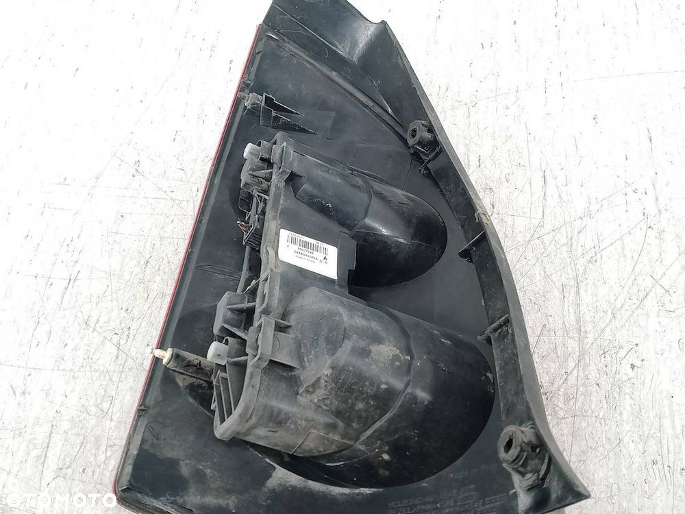 LAMPA TYLNA PRAWA NISSAN PRIMERA P12 ( 03-07 ) 89077085  26550AU40A 1.8 16V - 5
