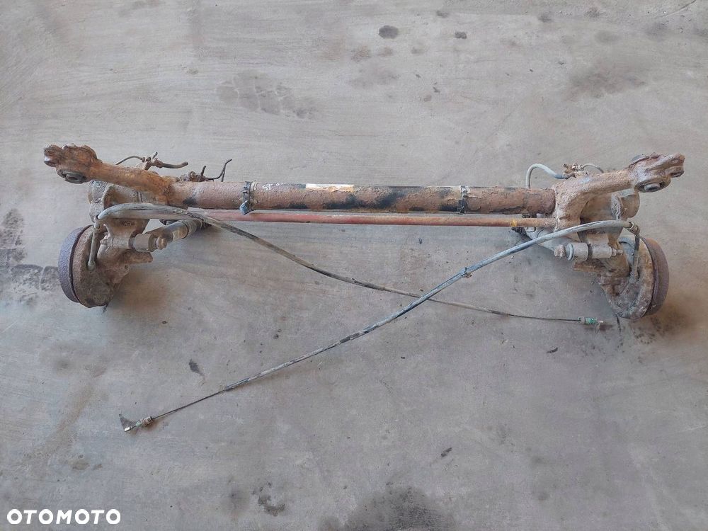 BELKA OŚ ZAWIESZENIA TYŁ BĘBNY BEZ ABS  PEUGEOT 206 I - 1