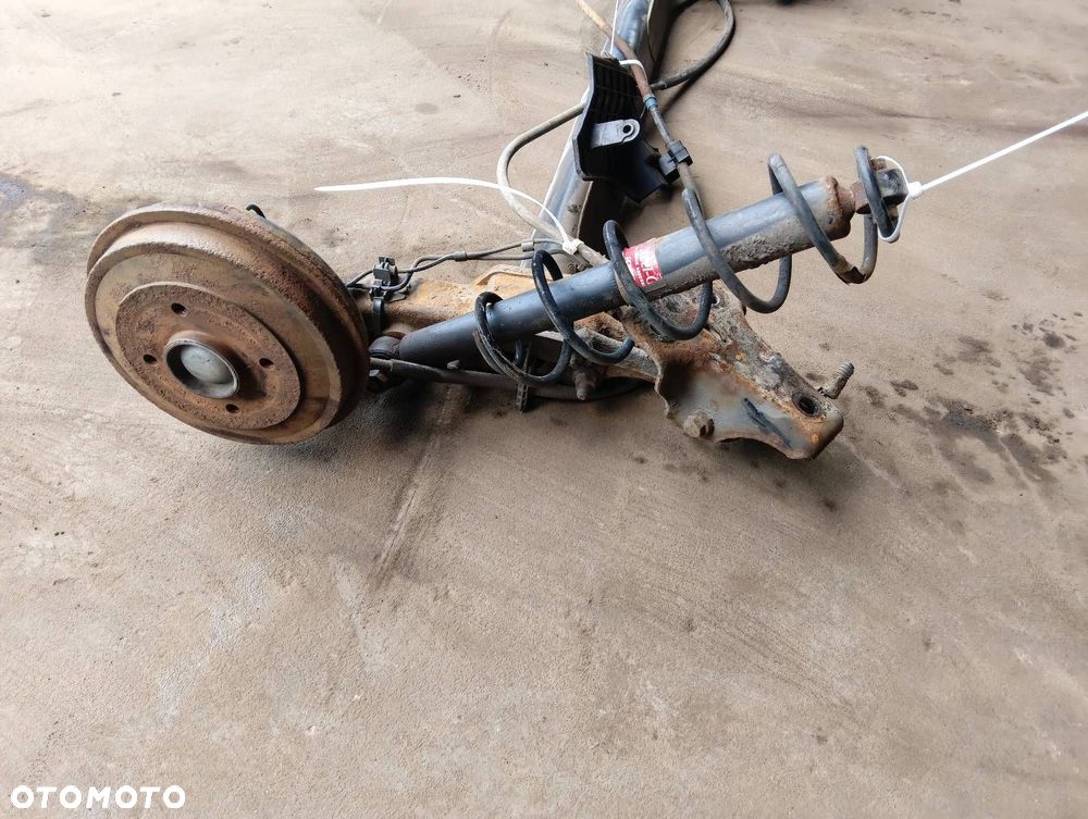 BELKA OŚ ZAWIESZENIA TYŁ BĘBNY Z ABS CITROEN C3 I - 4