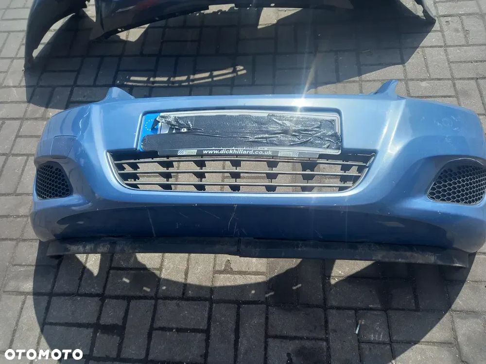 Zafira b zderzak przod blekitny