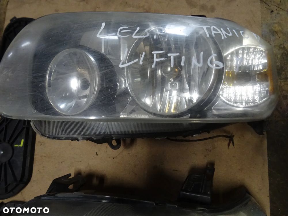 FORD MAVERICK LIFTING LAMPA LEWA TANIO CZESCI ROZNE PYTAC - 4