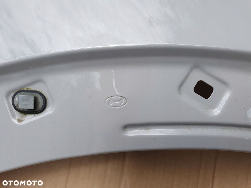 HYUNDAI IONIQ 5 V BŁOTNIK LEWY 2021 - 2