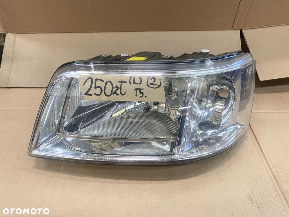 VW TRANSPORTER T5 MULTIVAN CARAVELLE 03- LAMPA PRZEDNIA LEWA - 1
