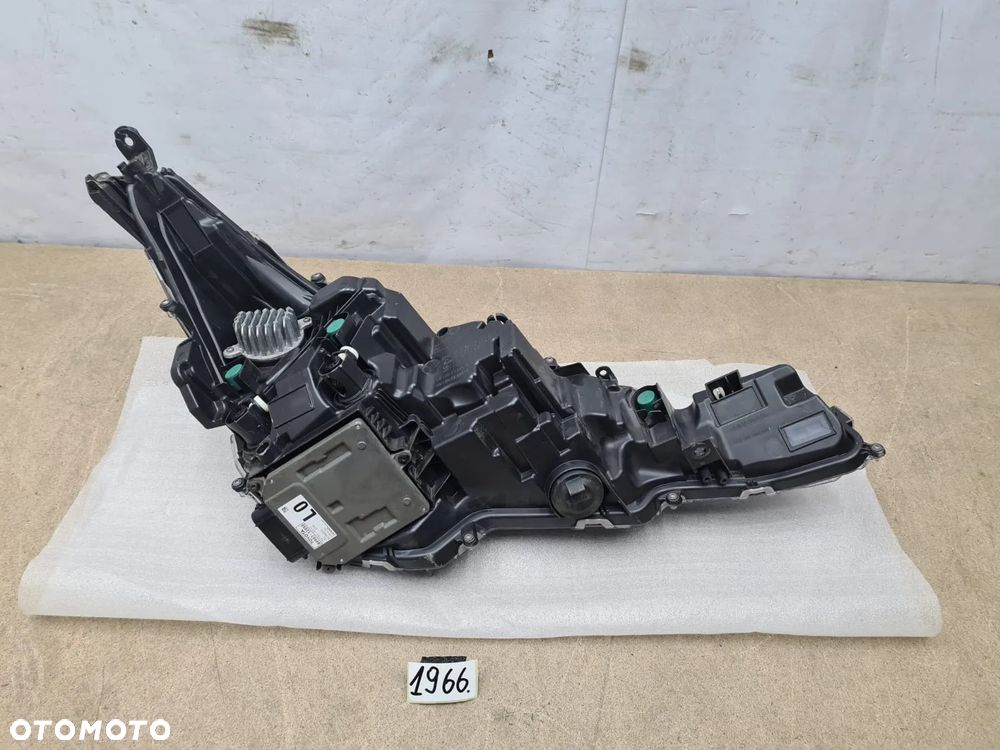 Toyota Corolla E21 kombi/HB  lampa lewy lewa  przód używana 81170-02585 - 4