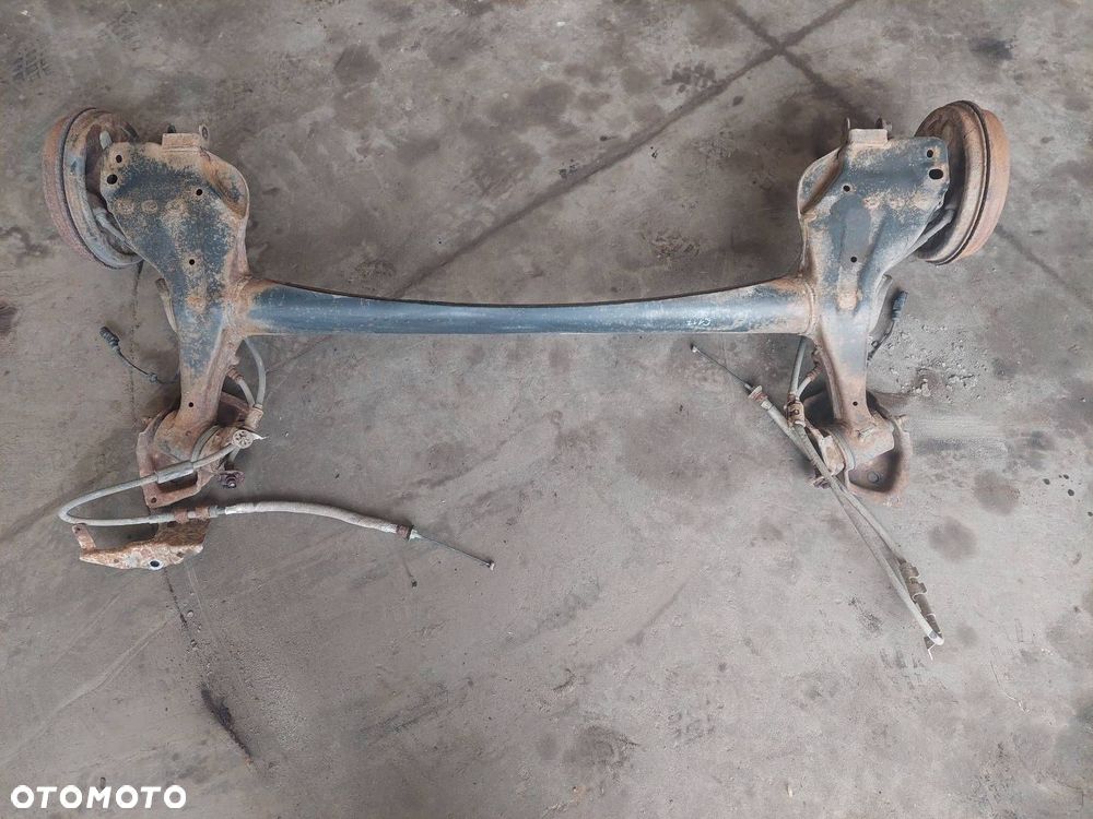 BELKA OŚ ZAWIESZENIA TYŁ BĘBNY Z ABS FIAT GRANDE PUNTO I - 1