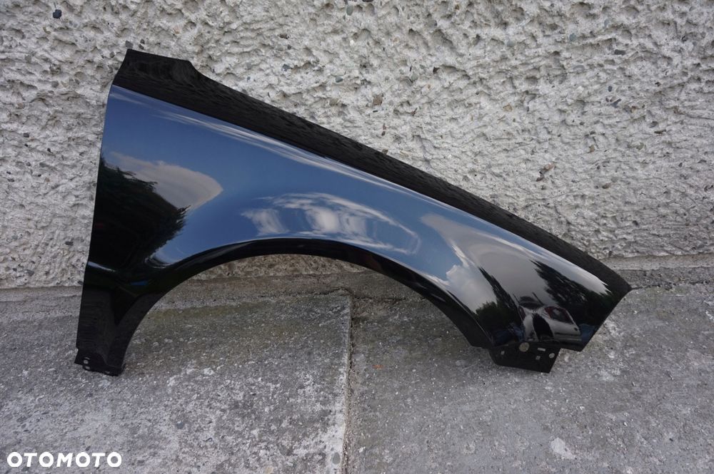 BŁOTNIK PRZÓD PRAWY VW PASSAT B5 LIFT 03/05r LC9Z